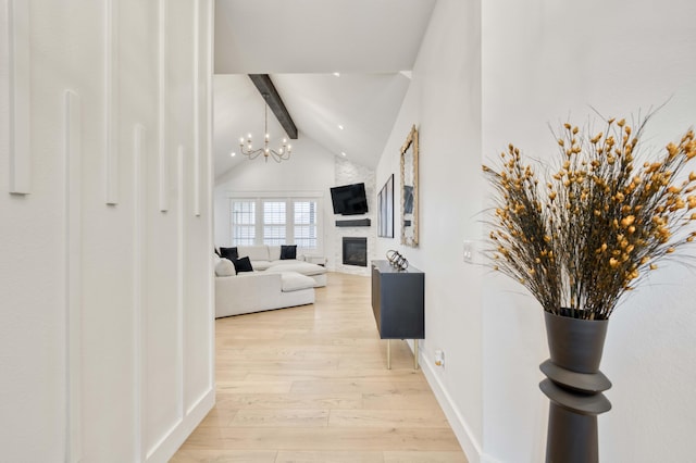 1674 N Marlowe Ave, Springfield, MO 65802 - corridor featuring light wood-type flooring, a chandelier, and baseboards