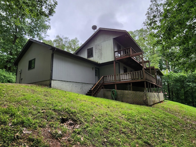 29039 Nottinghill Dr, Shell Knob, MO 65747 - rear view of house with stairs, a lawn, and a wooden deck