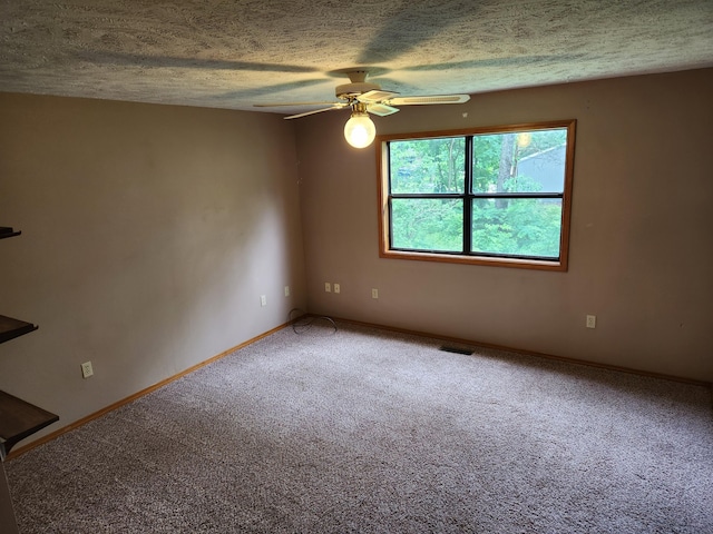 29039 Nottinghill Dr, Shell Knob, MO 65747 - carpeted spare room with a ceiling fan and a textured ceiling