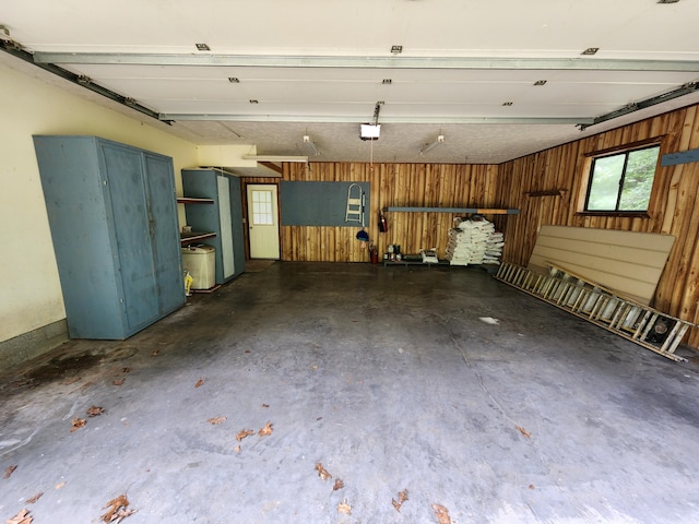 29039 Nottinghill Dr, Shell Knob, MO 65747 - garage with wood walls and a garage door opener