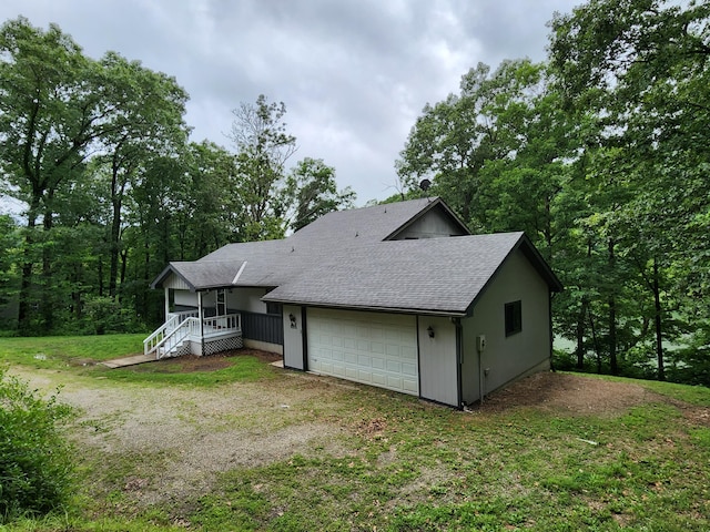 29039 Nottinghill Dr, Shell Knob, MO 65747 - rear view of house with roof with shingles, a garage, and a yard