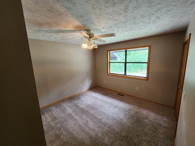 29039 Nottinghill Dr, Shell Knob, MO 65747 - unfurnished room featuring a ceiling fan, carpet floors, and a textured ceiling