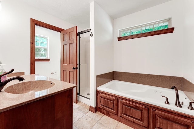 2029 Moon Valley Rd, Ozark, MO 65721 - bathroom with a bath, a stall shower, tile patterned flooring, and vanity