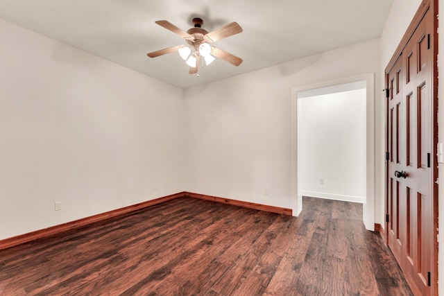 2029 Moon Valley Rd, Ozark, MO 65721 - unfurnished room featuring ceiling fan, dark wood finished floors, and baseboards