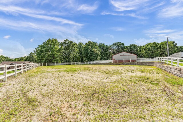 2029 Moon Valley Rd, Ozark, MO 65721 - view of yard with an outbuilding, an exterior structure, an enclosed riding area, and a view of rural / pastoral area