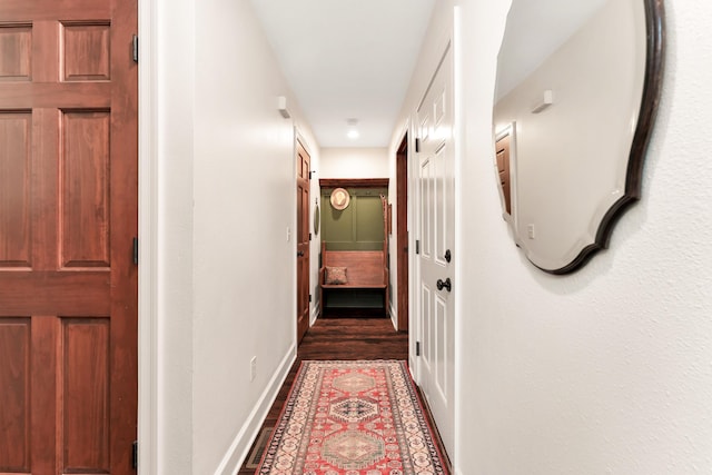2029 Moon Valley Rd, Ozark, MO 65721 - hall with dark wood-style flooring and baseboards