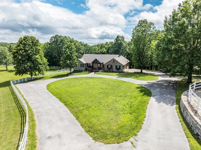 2029 Moon Valley Rd, Ozark, MO 65721 - tudor home with curved driveway and stone siding
