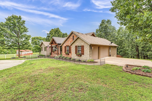 2029 Moon Valley Rd, Ozark, MO 65721 - view of front facade featuring stone siding, driveway, a garage, metal roof, and a standing seam roof