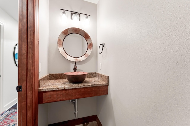 2029 Moon Valley Rd, Ozark, MO 65721 - bathroom with a sink and baseboards