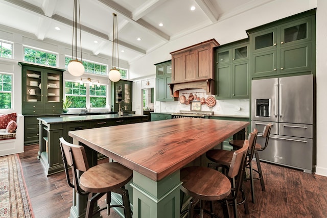 2029 Moon Valley Rd, Ozark, MO 65721 - kitchen featuring green cabinets, high end refrigerator, a kitchen island with sink, dark wood-style floors, and healthy amount of natural light