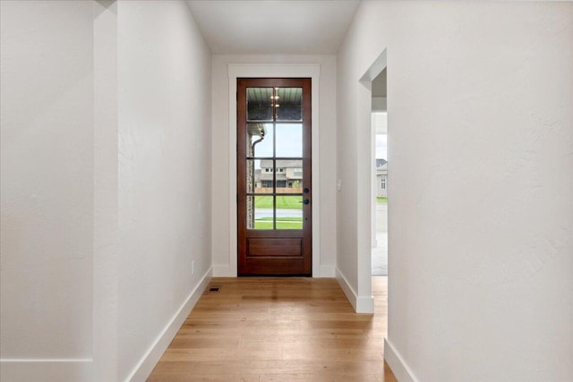4943 S Aaron Ave, Springfield, MO 65810 - doorway to outside featuring light wood finished floors and baseboards