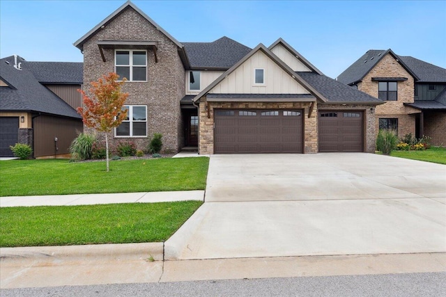 4943 S Aaron Ave, Springfield, MO 65810 - craftsman inspired home featuring an attached garage, concrete driveway, board and batten siding, a front yard, and brick siding