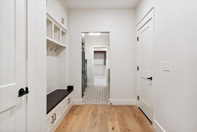 4943 S Aaron Ave, Springfield, MO 65810 - mudroom featuring light wood-style floors and baseboards