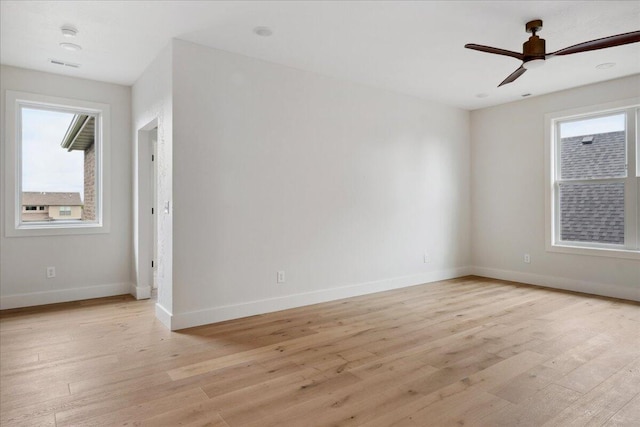 4943 S Aaron Ave, Springfield, MO 65810 - spare room with light wood-style flooring, ceiling fan, and baseboards
