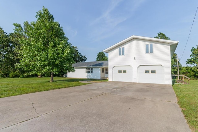310 S Shiloh Ave, Conway, MO 65632 - traditional home featuring an attached garage, concrete driveway, and a front lawn
