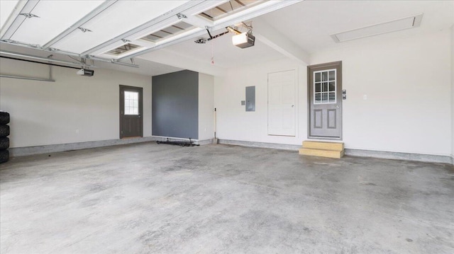 2606 Country Dr, Mountain Grove, MO 65711 - garage with a garage door opener and electric panel