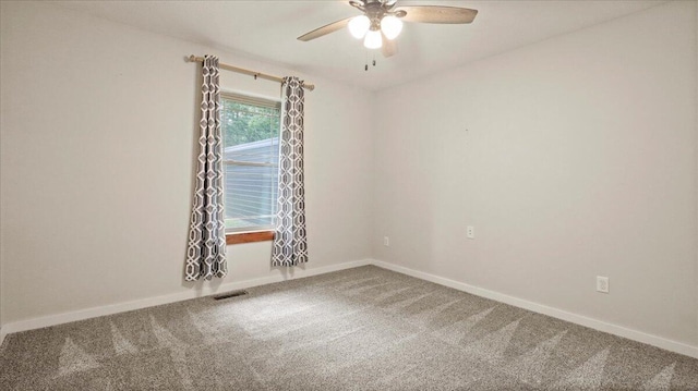 2606 Country Dr, Mountain Grove, MO 65711 - unfurnished room featuring carpet floors, a ceiling fan, and baseboards