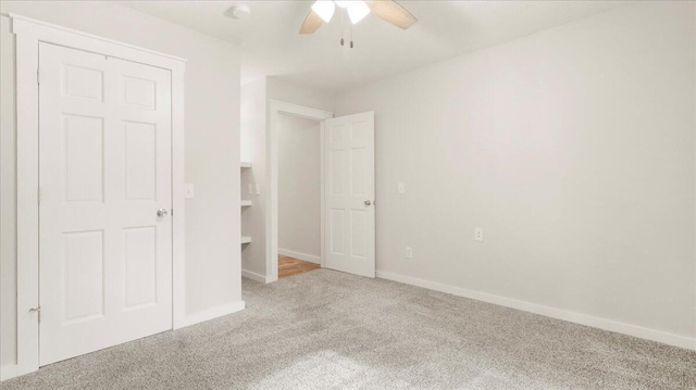 2606 Country Dr, Mountain Grove, MO 65711 - unfurnished bedroom with carpet flooring, baseboards, and ceiling fan