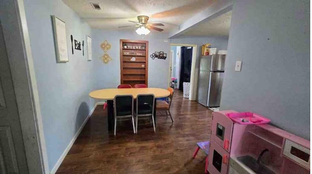 19508 State Highway 112, Cassville, MO 65625 - dining area with ceiling fan, dark wood-style floors, and baseboards