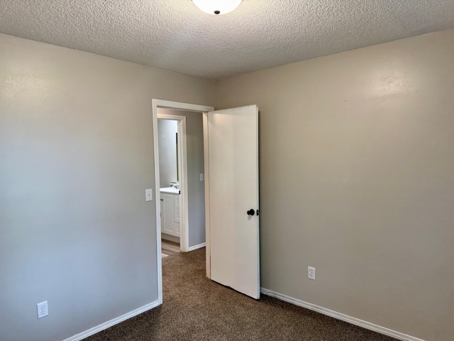 2004 S 16th St, Ozark, MO 65721 - carpeted spare room featuring a textured ceiling and baseboards