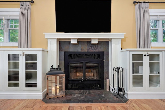401 E Glendale St, Aurora, MO 65605 - detailed view of wood finished floors and a fireplace