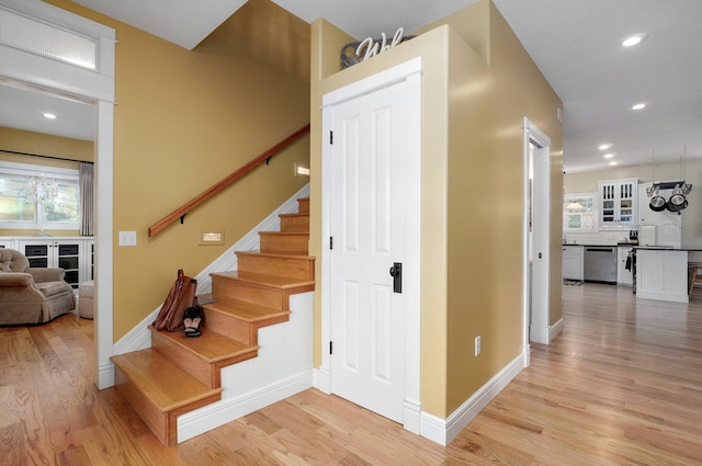 401 E Glendale St, Aurora, MO 65605 - stairs with wood finished floors, recessed lighting, and baseboards