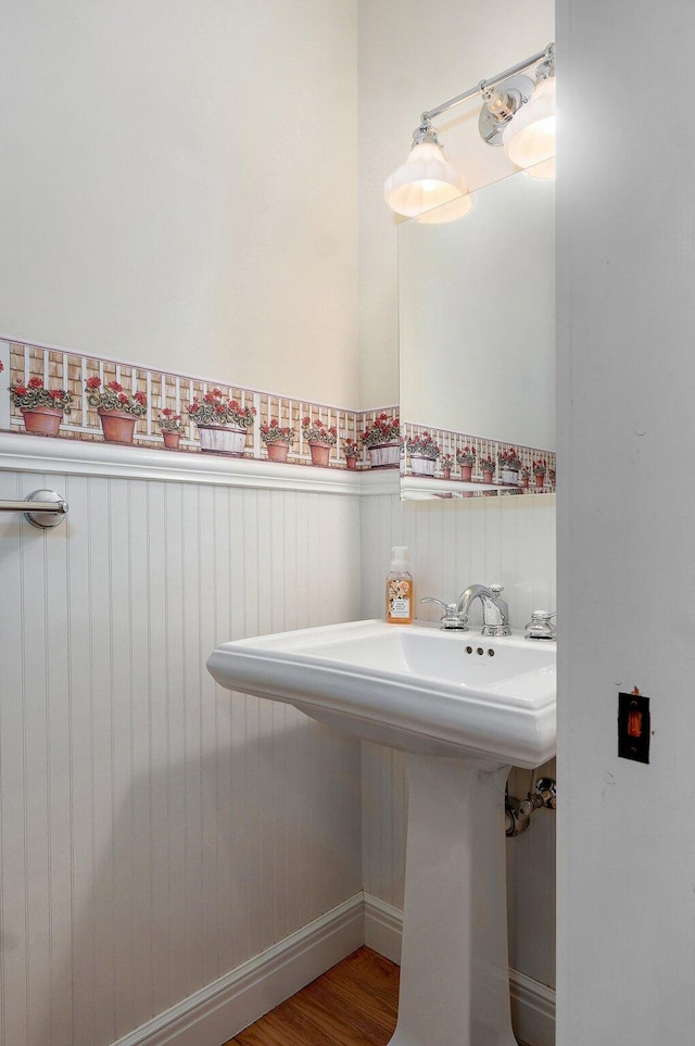401 E Glendale St, Aurora, MO 65605 - bathroom with a sink and wood finished floors