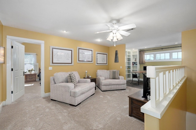 401 E Glendale St, Aurora, MO 65605 - living room with light colored carpet, ceiling fan, baseboards, and recessed lighting