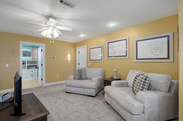 401 E Glendale St, Aurora, MO 65605 - living room featuring light colored carpet, a ceiling fan, baseboards, and recessed lighting