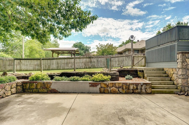 401 E Glendale St, Aurora, MO 65605 - fenced backyard with a patio