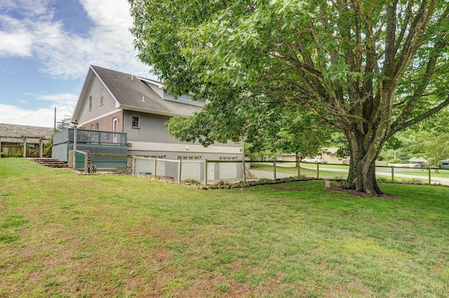 401 E Glendale St, Aurora, MO 65605 - view of yard with a wooden deck and a garage
