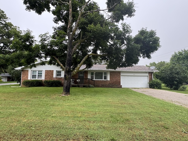 853 Sunset Ave, Marshfield, MO 65706 - ranch-style home with brick siding, gravel driveway, a garage, and a front yard
