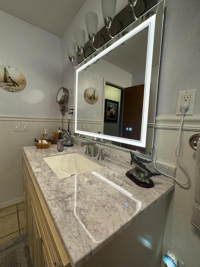 853 Sunset Ave, Marshfield, MO 65706 - bathroom with wainscoting, vanity, and tile patterned floors