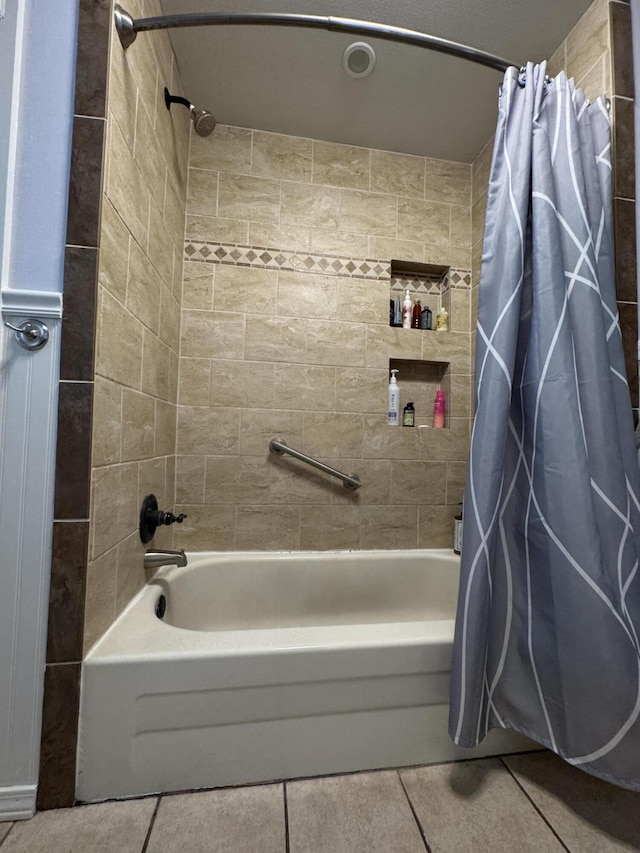 853 Sunset Ave, Marshfield, MO 65706 - bathroom with tile patterned flooring and shower / bathtub combination with curtain