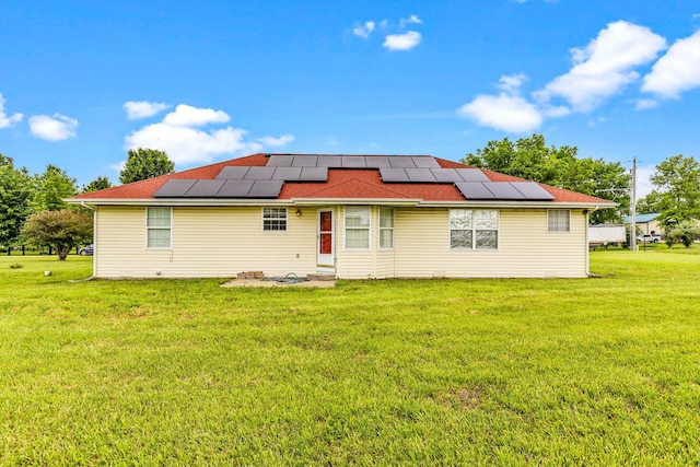 1640 E 541st Rd, Brighton, MO 65617 - rear view of property with solar panels, a yard, and entry steps