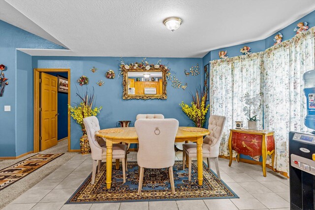 1640 E 541st Rd, Brighton, MO 65617 - dining area featuring healthy amount of natural light, tile patterned floors, and a textured ceiling