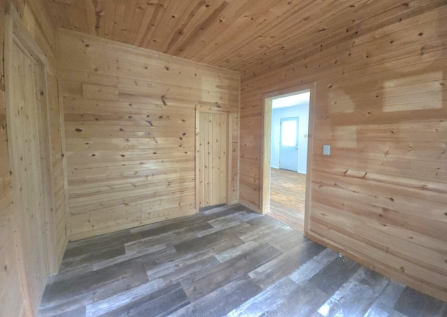 221 Boisseau St, Greenfield, MO 65661 - unfurnished room with wooden walls, wood finished floors, and wooden ceiling