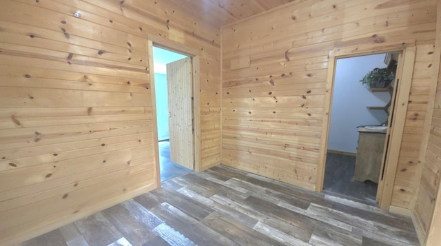 221 Boisseau St, Greenfield, MO 65661 - empty room featuring wood walls, wood finished floors, and wooden ceiling