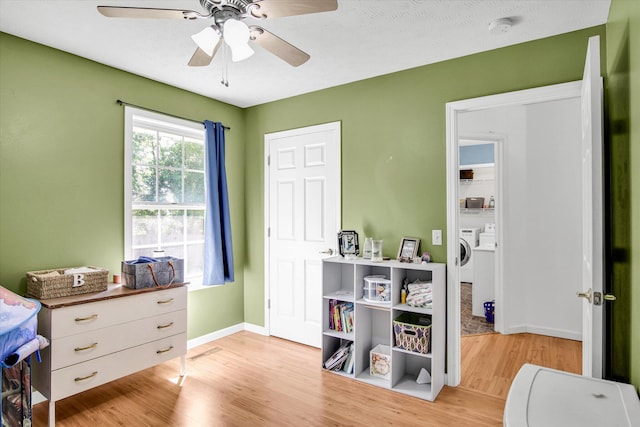 113 Holly Ridge Rd, Willard, MO 65781 - bedroom with wood finished floors, baseboards, and a ceiling fan