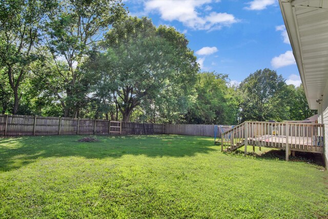 113 Holly Ridge Rd, Willard, MO 65781 - view of yard with a wooden deck and view of wooded area