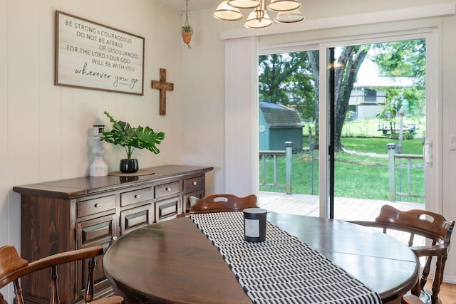 225 Elim St, Forsyth, MO 65653 - dining area featuring a chandelier