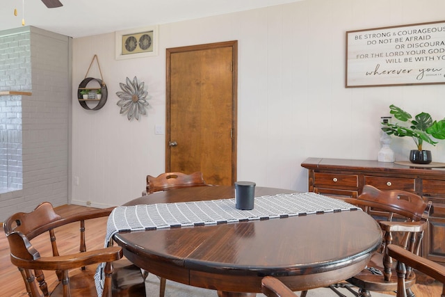 225 Elim St, Forsyth, MO 65653 - dining area featuring light wood-style floors, ceiling fan, and baseboards