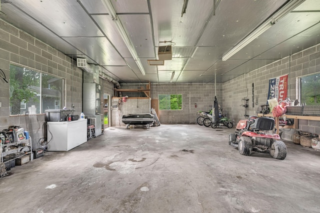 21371 Howell Rd, Mountain View, MO 65548 - garage with concrete block wall and heating unit