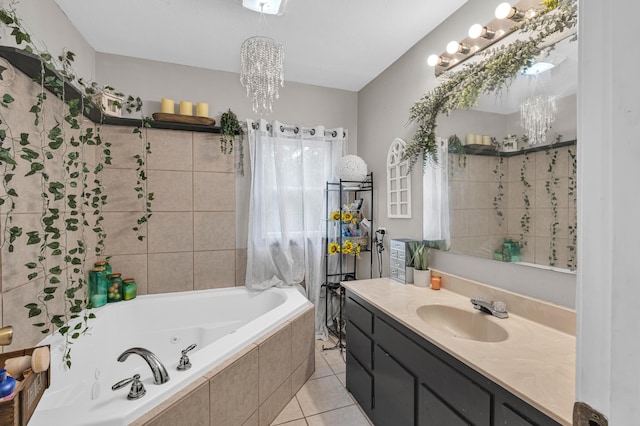 21371 Howell Rd, Mountain View, MO 65548 - full bath featuring a tub with jets, tile patterned floors, vanity, and a chandelier