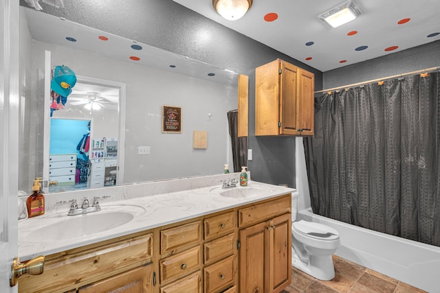 21371 Howell Rd, Mountain View, MO 65548 - bathroom with toilet, double vanity, shower / tub combo with curtain, and ceiling fan