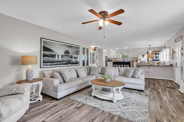 21371 Howell Rd, Mountain View, MO 65548 - living area featuring a ceiling fan and wood finished floors