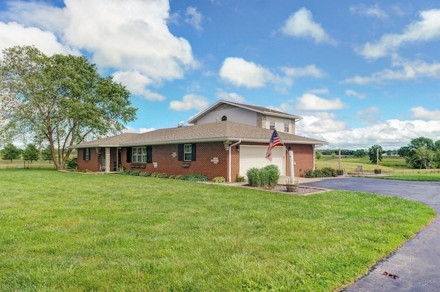 2526 State Highway B, Rogersville, MO 65742 - view of front of house with driveway, a garage, and brick siding