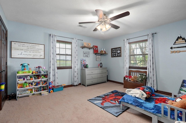 2526 State Highway B, Rogersville, MO 65742 - carpeted bedroom with multiple windows, a ceiling fan, and baseboards