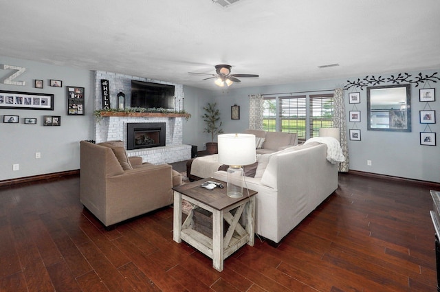 2526 State Highway B, Rogersville, MO 65742 - living room with baseboards, a ceiling fan, dark wood-type flooring, and a fireplace