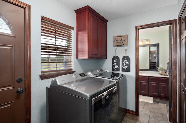 2526 State Highway B, Rogersville, MO 65742 - washroom featuring independent washer and dryer, cabinet space, stone finish floors, and plenty of natural light